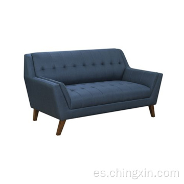 Sofá de ocio de tela azul con patas de madera maciza
